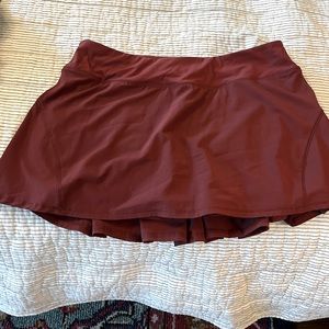 Cute burgundy/rust colored ruffle skirt